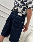 Bermuda denim blu scuro con cuciture bianche
