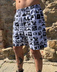 Pantaloncini corti bianchi con stampe nere