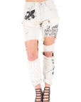 Jeans con strappi e graffiti