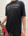T shirt nera stampa "Love is a feeling"