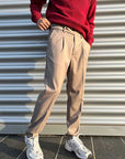 Pantaloni beige dritti con pinces