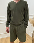 Maglia verde militare scollo a v con rotture