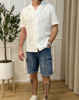 Bermuda in denim cargo