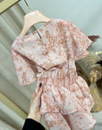 Vestito pitonato rosa con balze