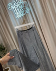 Pantaloni in lurex argento con pinces