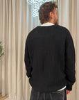 Maglione con mix di intrecci e filo bianco