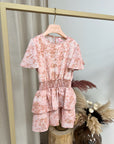 Vestito pitonato rosa con balze