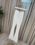Pantaloni in pizzo bianchi a zampa