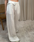 Pantaloni a palazzo bianchi con cintura
