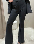 Tailleur nero doppiopetto revers in raso