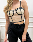 Top corsetto nude con finiture nere
