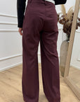 Pantaloni bordeaux con risvolto in vita bianco - HaveOne