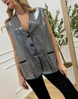 Gilet nero con specchietti argento