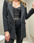 Tailleur nero doppiopetto revers in raso