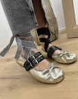 Ballerine in denim con rotture