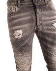 Jeans biker con cerniera in vita