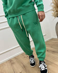 Joggers verde ricamo logo W