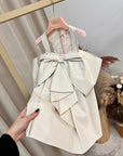 Vestito nude con fiocco
