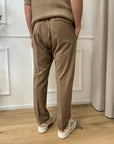 Pantaloni beige dritti con elastico in vita