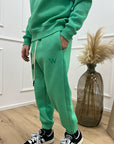 Joggers verde ricamo logo W