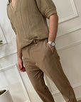 Pantaloni beige dritti con elastico in vita