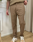 Pantaloni beige dritti con elastico in vita