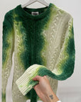 Maglione con trecce verde effetto candeggio