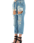 Jeans strappato con logo