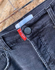 Bermuda in denim nero con logo sul retro