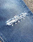 Jeans blu taglio ginocchio