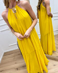 Vestito giallo scollo halter in georgette