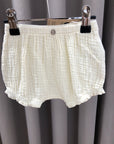 Pantaloncino panna con bottone in cocco
