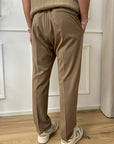 Pantaloni beige dritti con elastico in vita