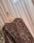 Maglia leopardata con maniche arricciate